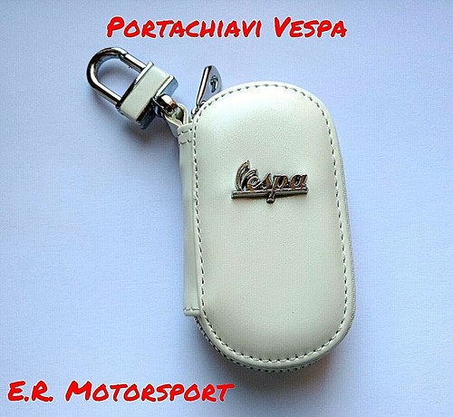 Portachiavi contenitivo - , in